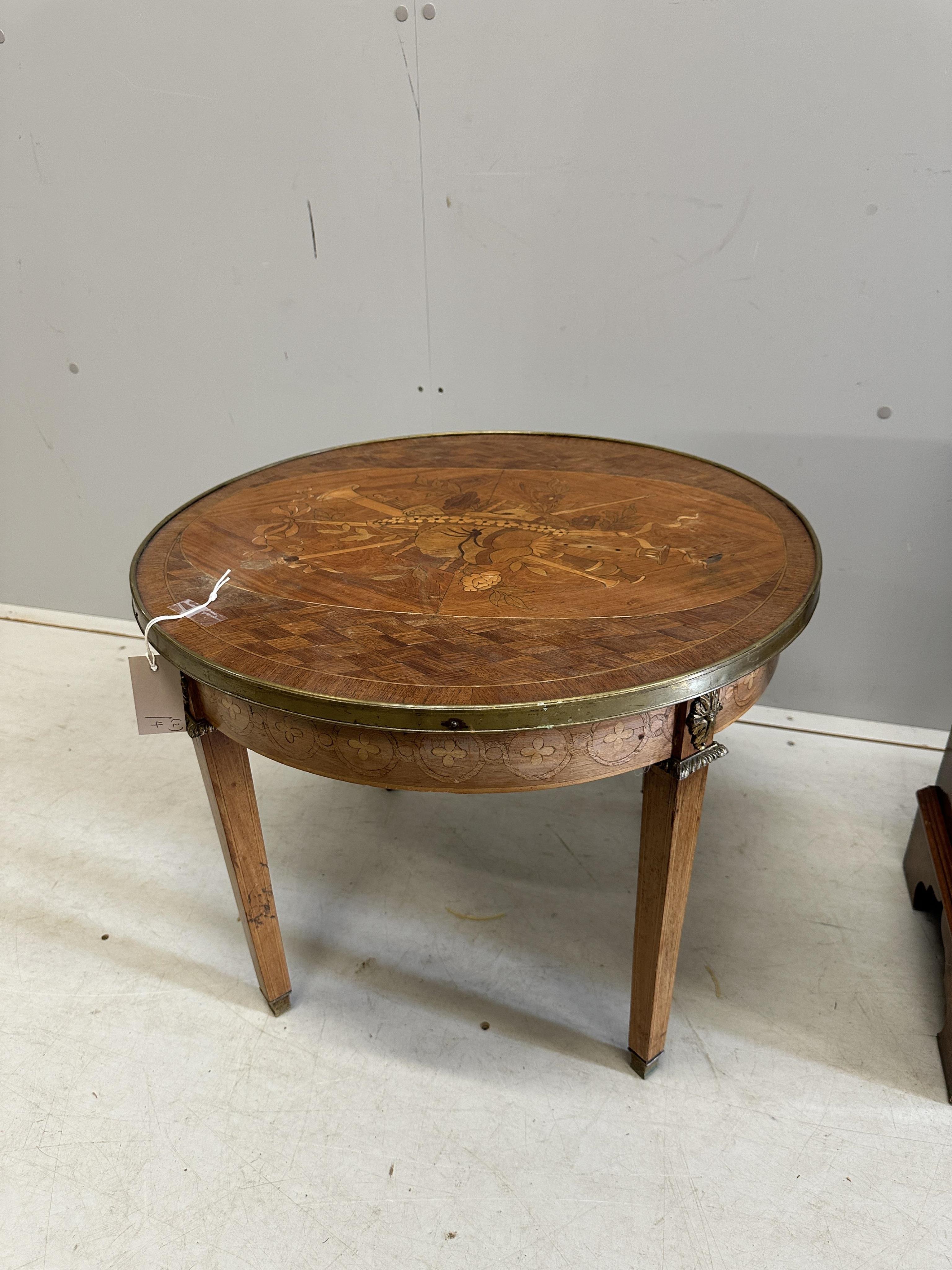 A French Transitional style circular marquetry inlaid coffee table, diameter 59cm, height 46cm together with a walnut speaker cabinet. Condition - poor to fair